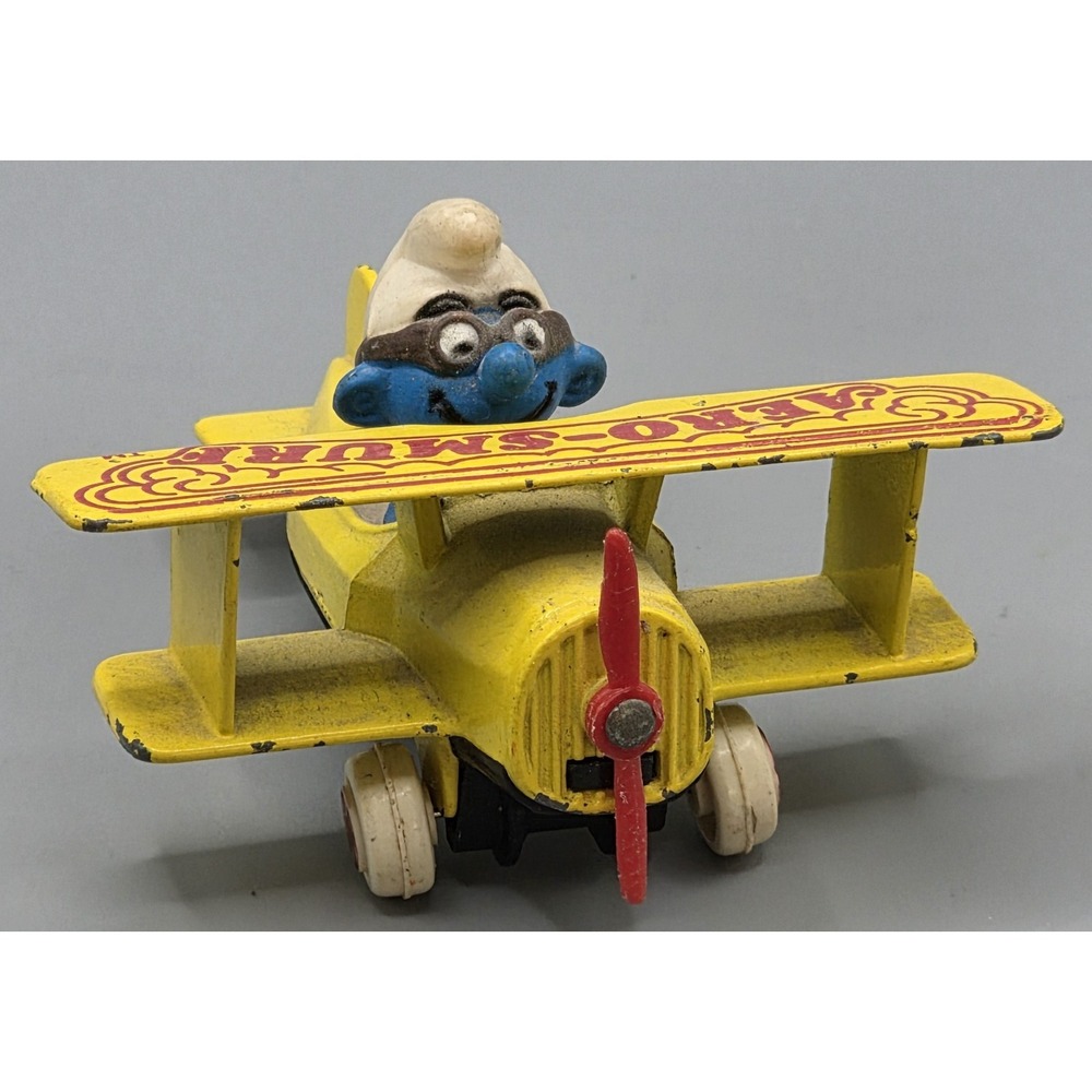 Vintage 1982 ERTL Aero Smurf Yellow Diecast Airplane Peyo Smurfs Toy Propeller - Picture 1 of 10